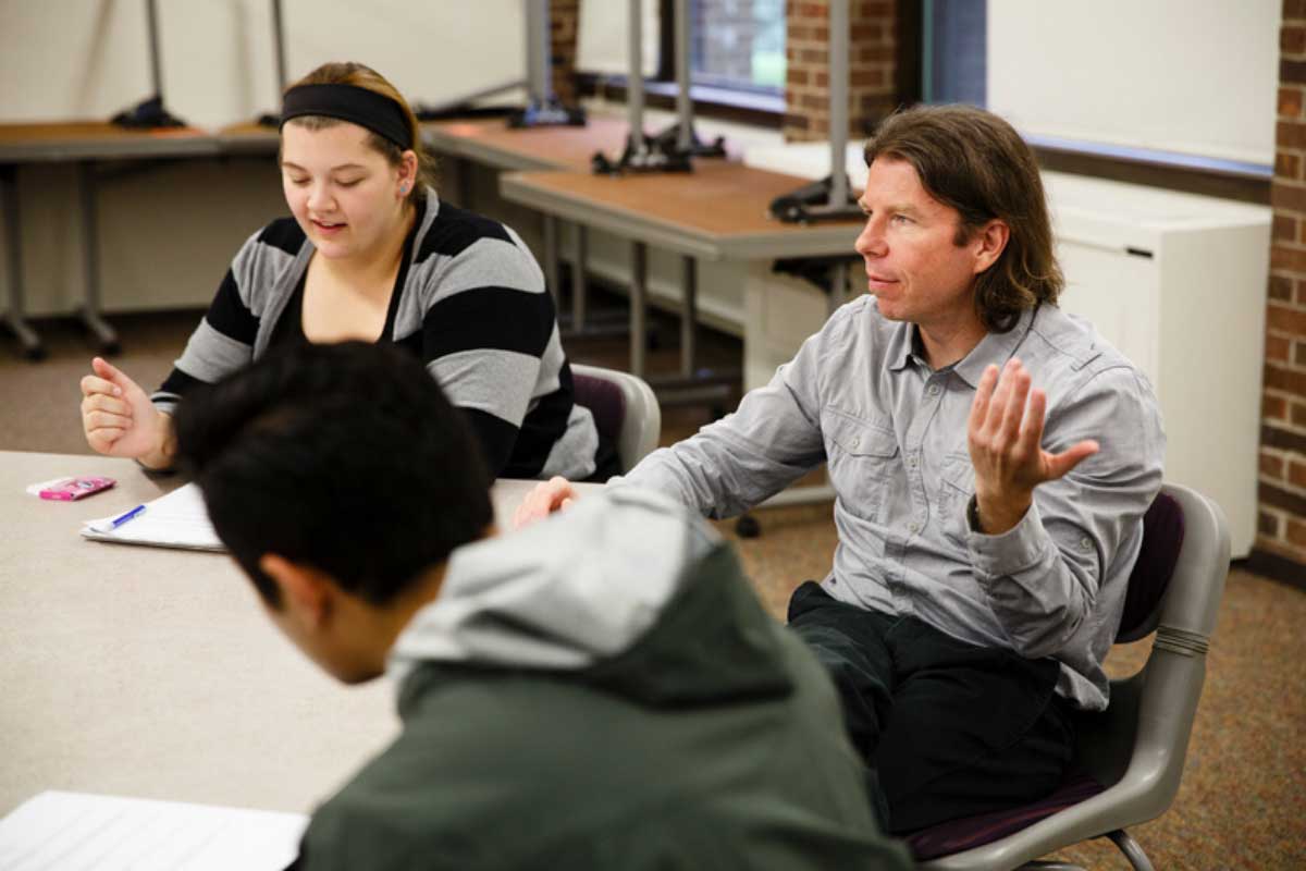 Film Studies adjunct faculty member James Snapko leads a discussion with students.