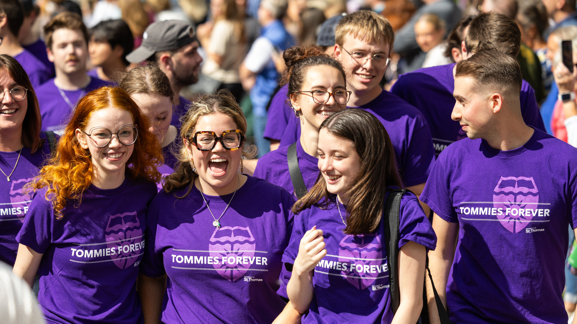 Students march out of the arches