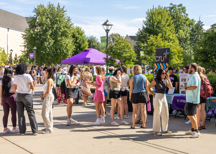 Students walking around an Activity Fair