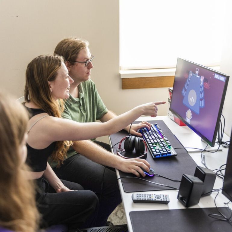Students working in the video game studio