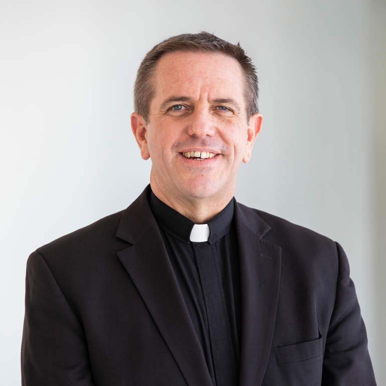 Head shot of Father Christopher Collins