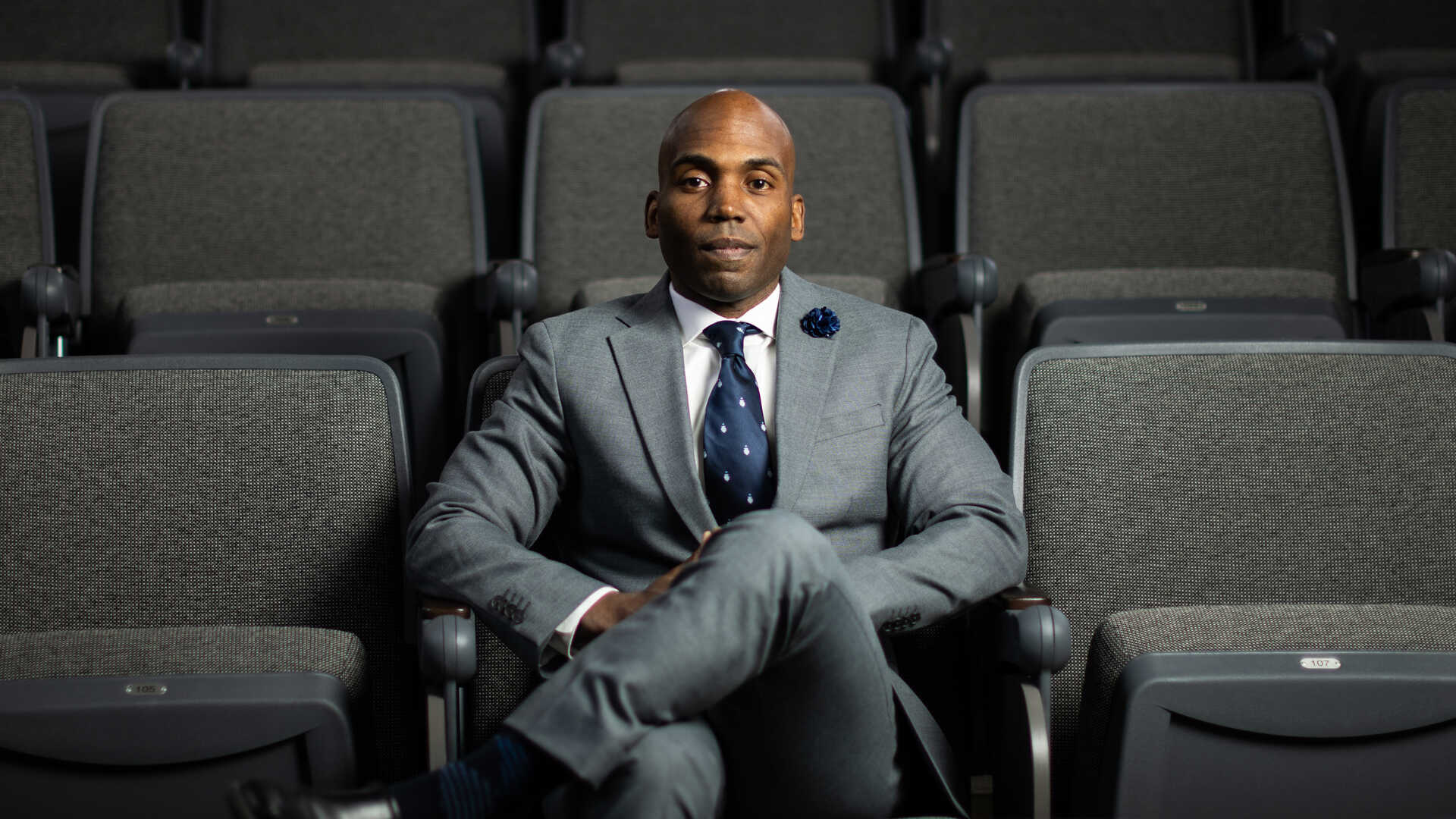 Dr. Yohuru Williams Sitting in an Auditorium