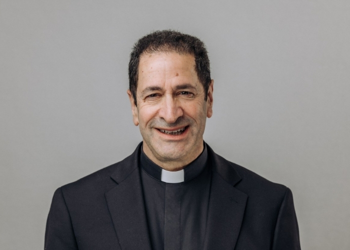 Father Timothy Kesicki, SJ, smiles for a headshot