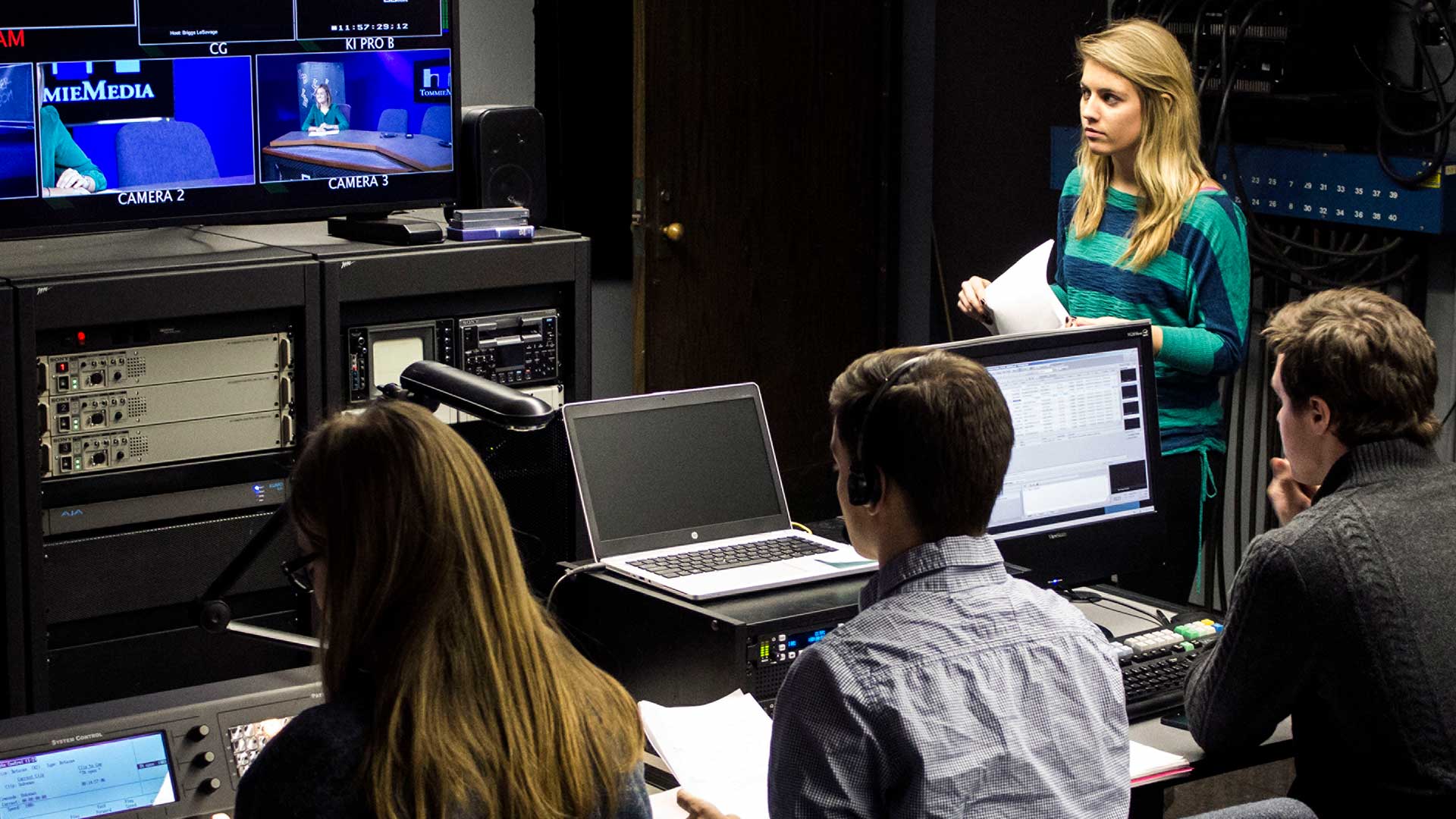 TommieMedia students working in a production studio.