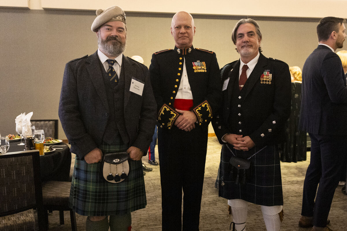 a group of veterans in uniform including kilts at the yearly veterans ball