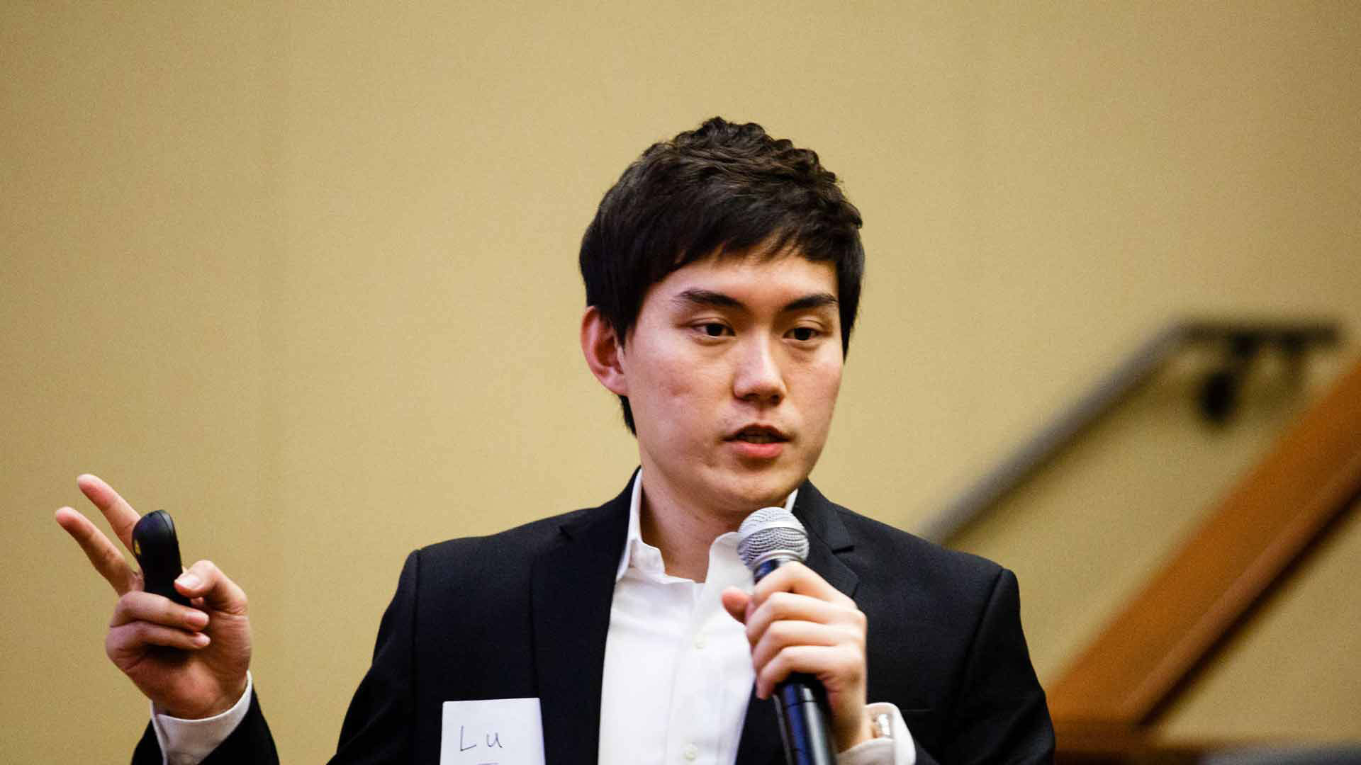 International student Lu Chen speaks during a business plan competition.