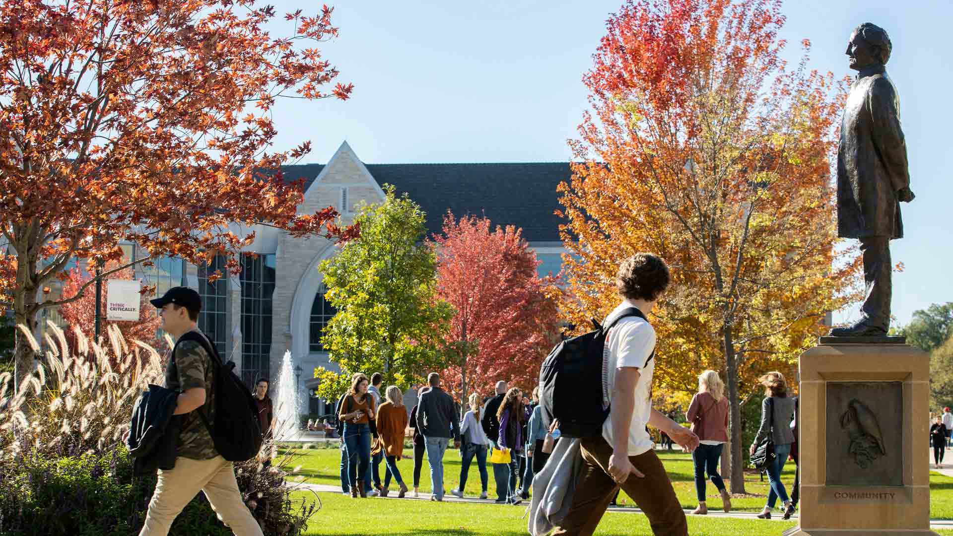 St. Thomas students walk through campus during the fall.