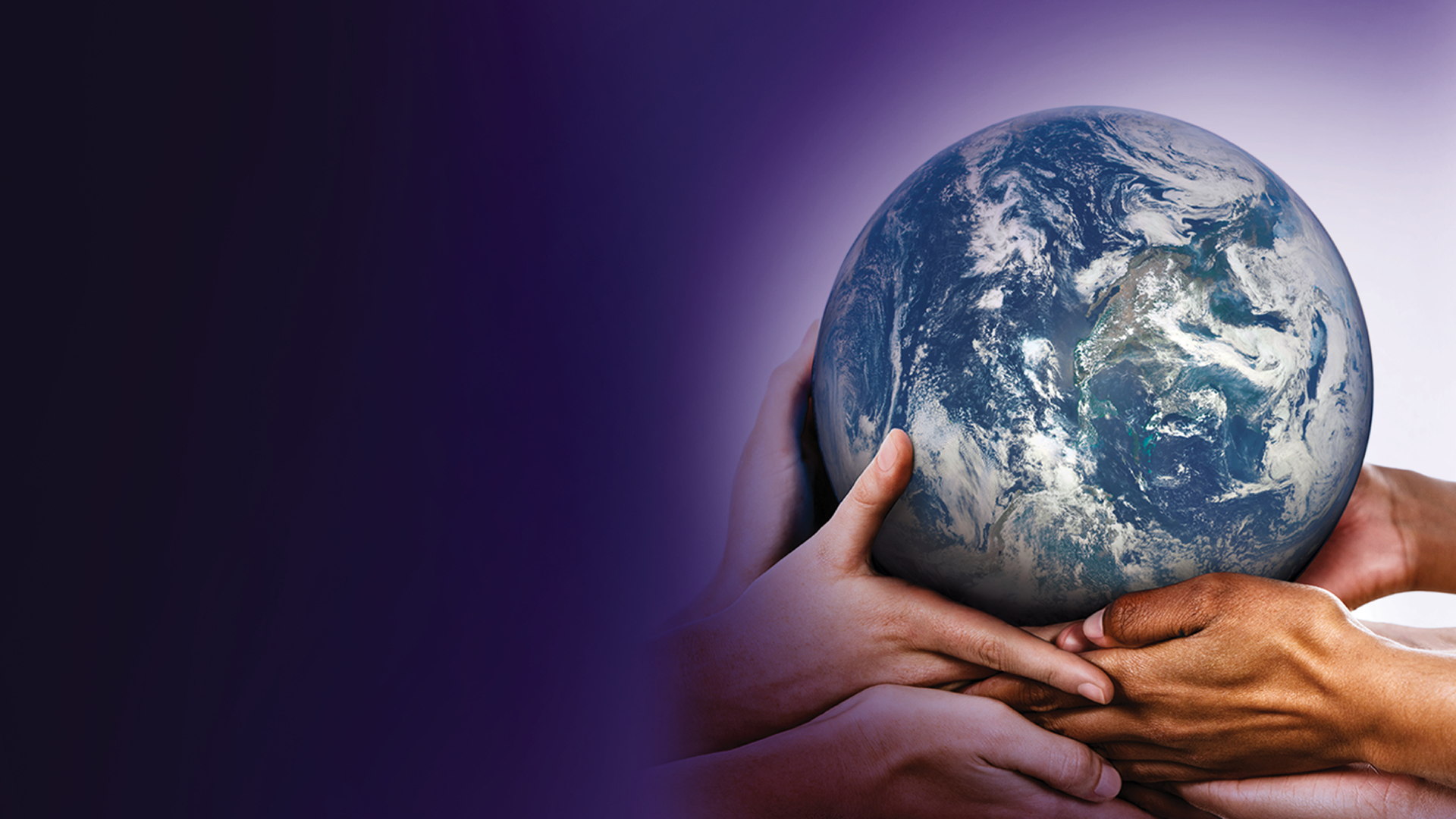 A picture of the globe held up by 2 hands