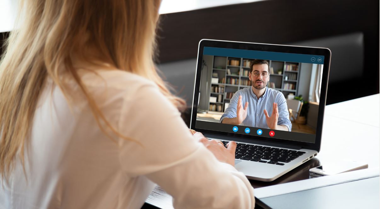 Laptop showing a virtual interviewer