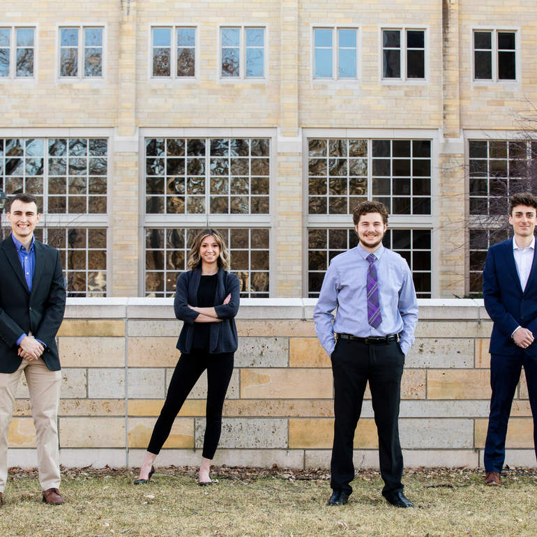 Senior engineering design students pose as a team on south campus – unmasked 