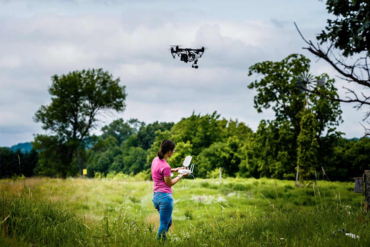 Student Emma Rinn flies a drone