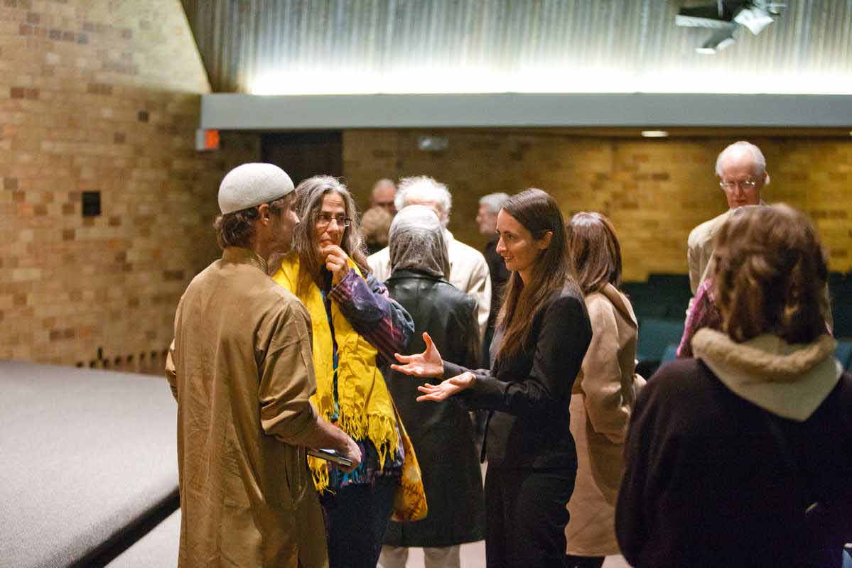 Guests converse at a Jay Phillips Center event