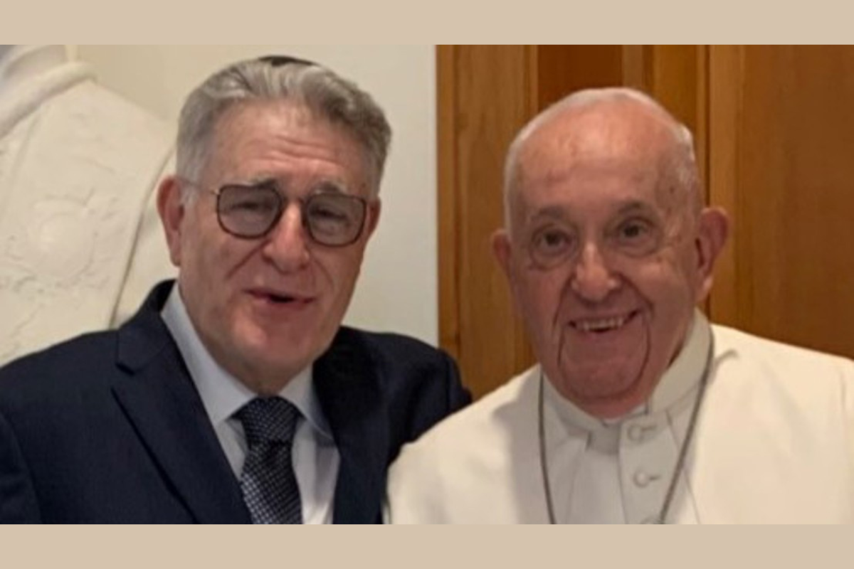 Rabbi Skorka and Pope Francis smile while posing for a photo together