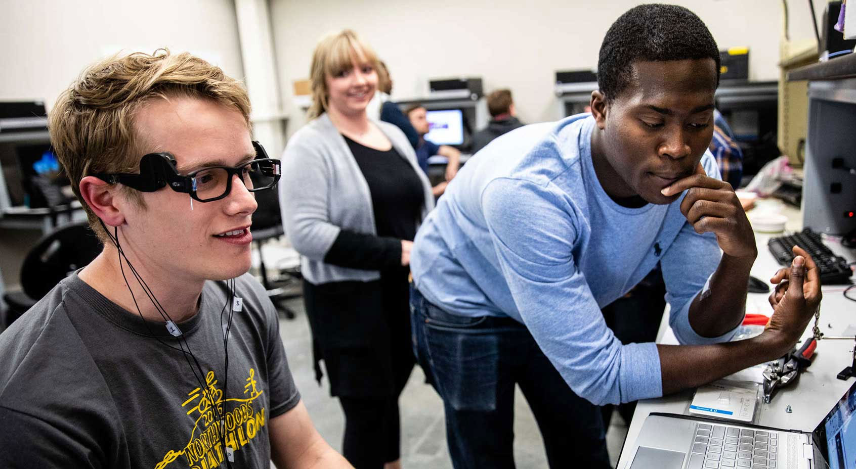 Engineering students work on their senior design projects by monitoring brainwaves.