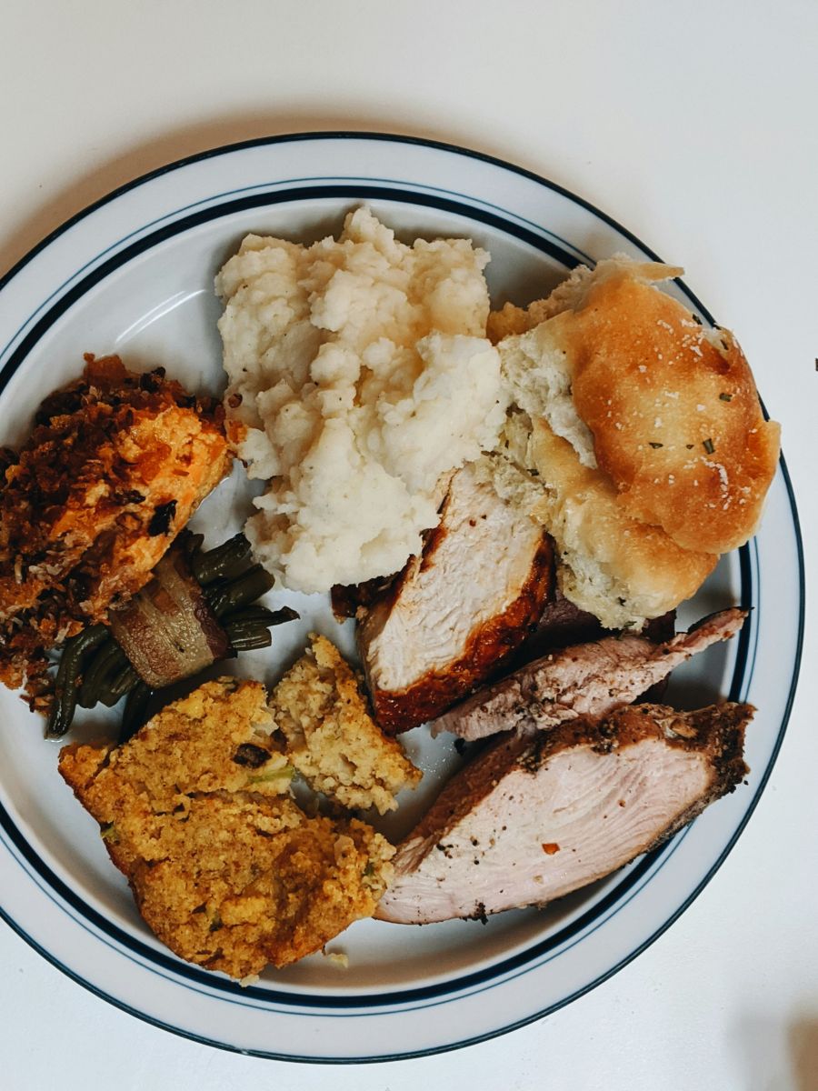 Plate of food with Thanksgiving dishes