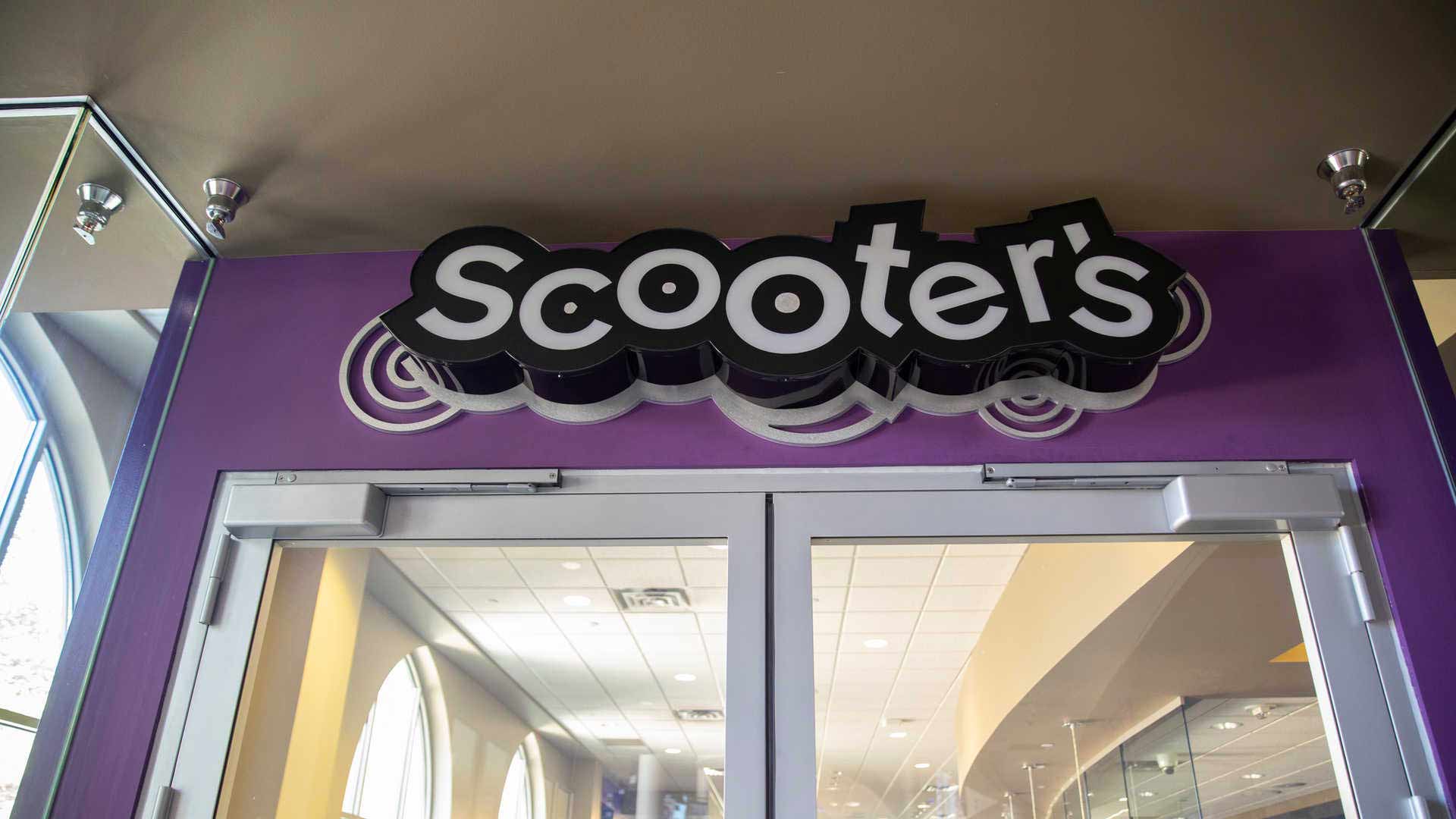 Scooters signage above door