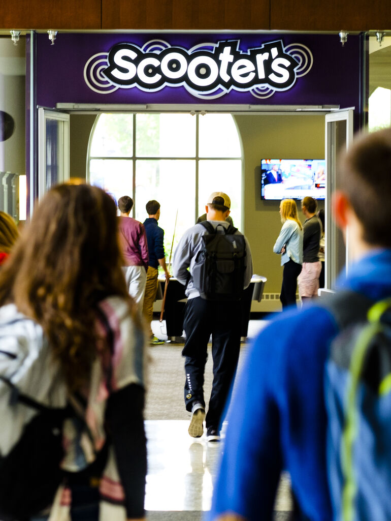 Students Walking to Scooter's Dining Location