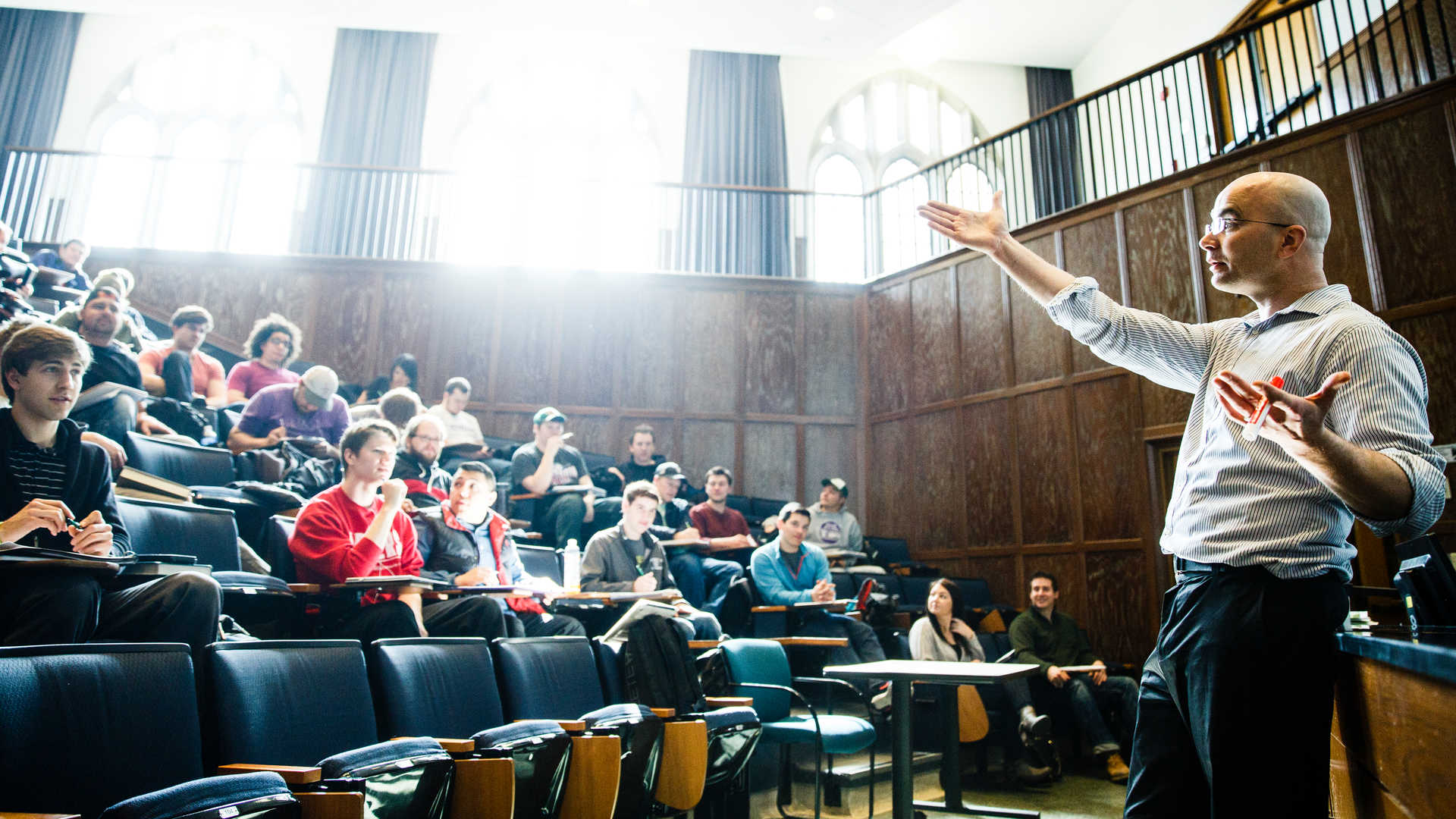 Professor teaching students in JRC Auditorium