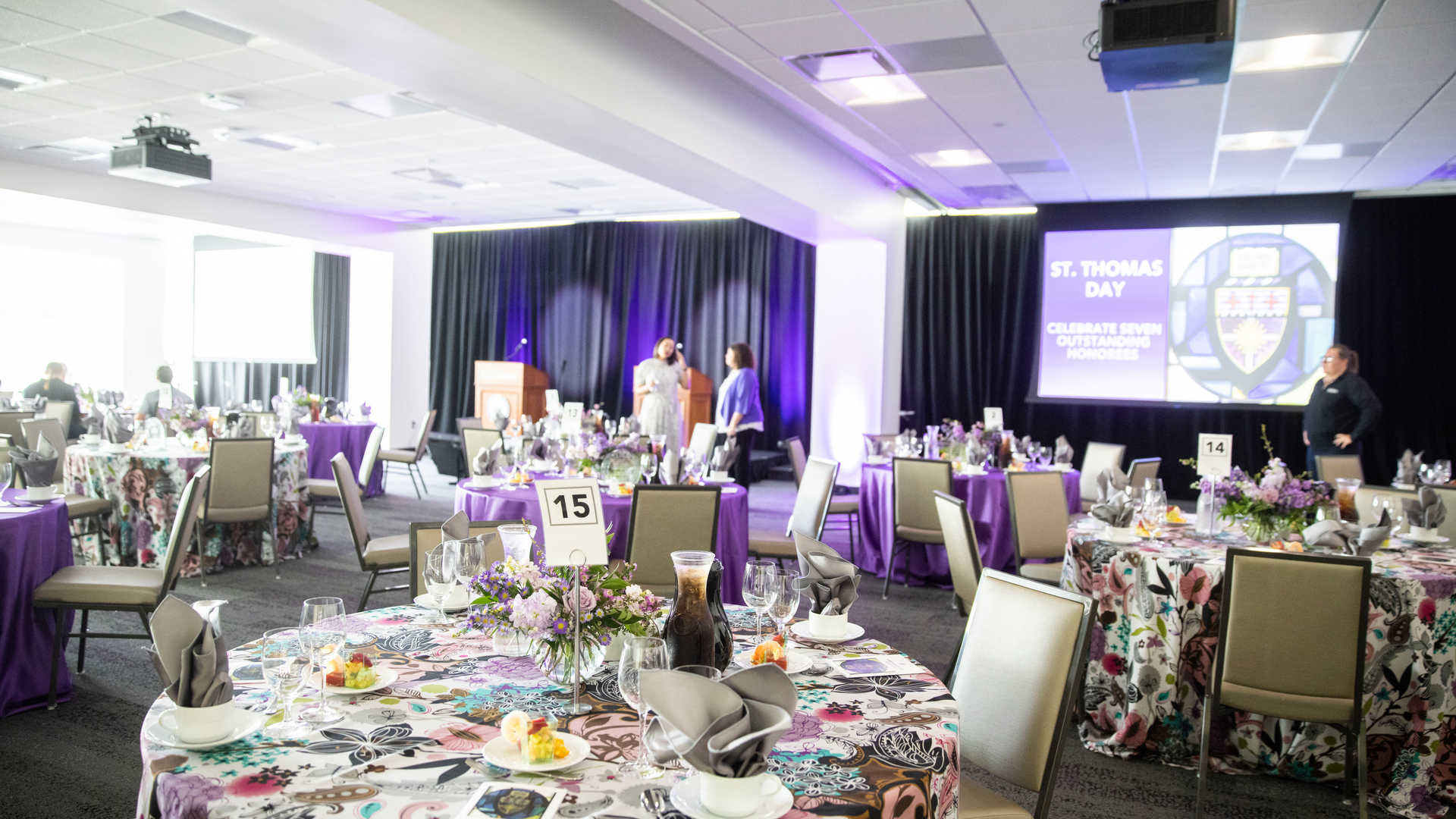 Place settings on the tables in Schoenecker Hall