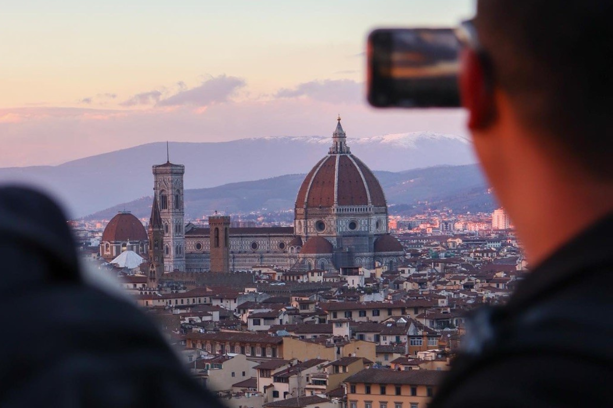 student taking photo of Duomo in Florence