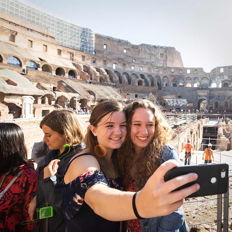 Women take selfie in Coliseum