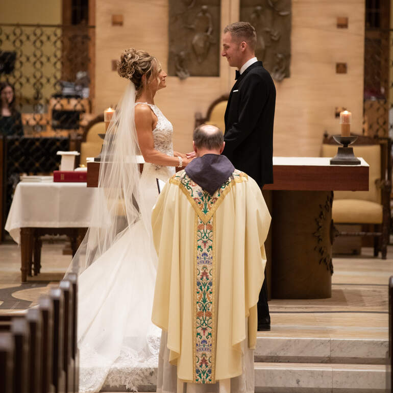 wedding couple at the altar