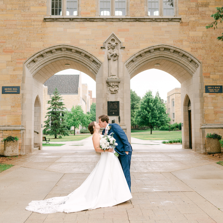 couple in front of the arches