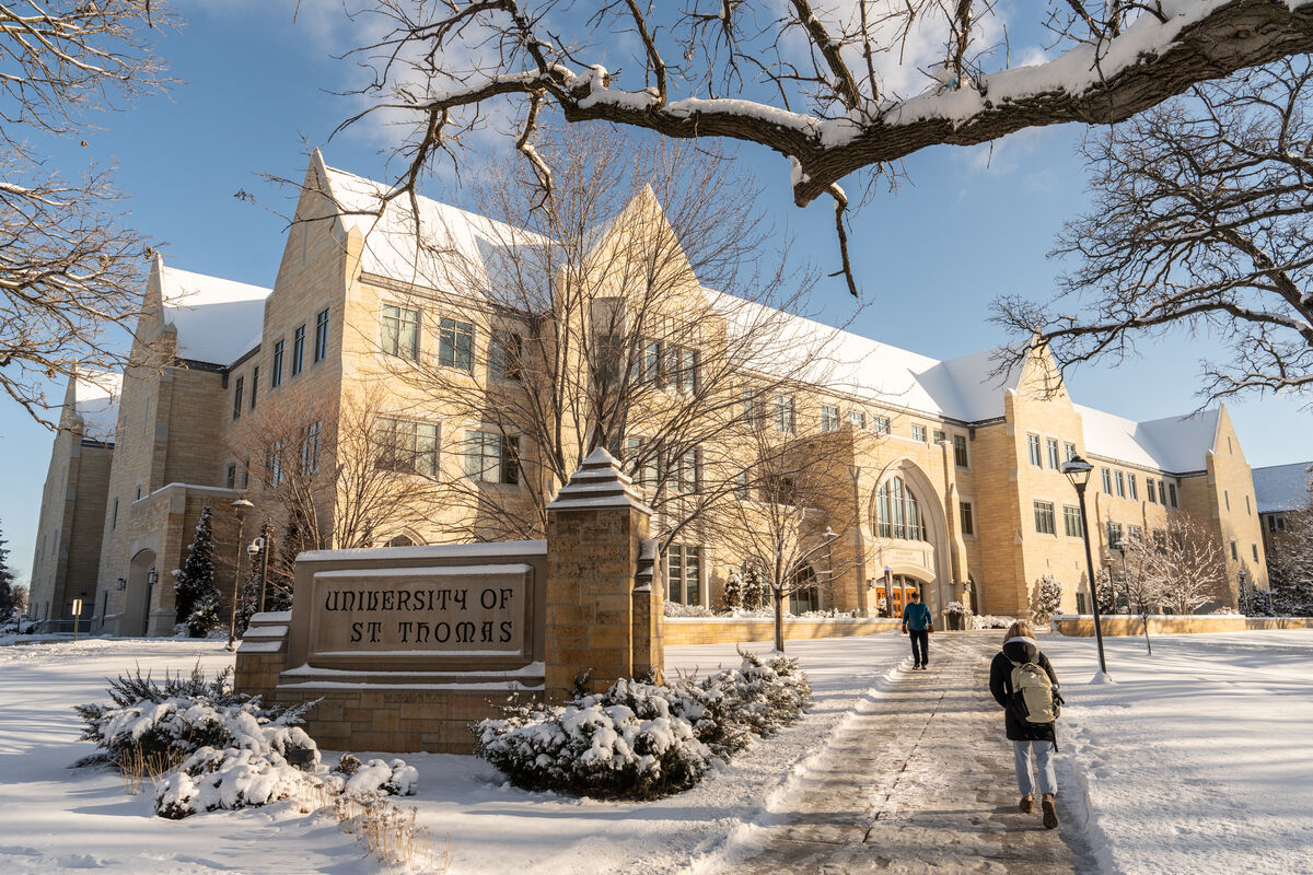 Winter scene by university sign