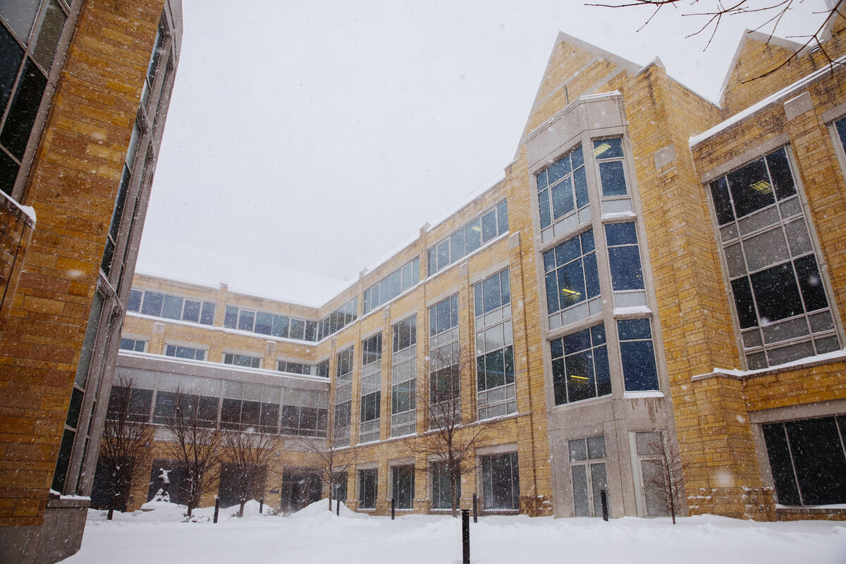 Snowing in campus courtyard