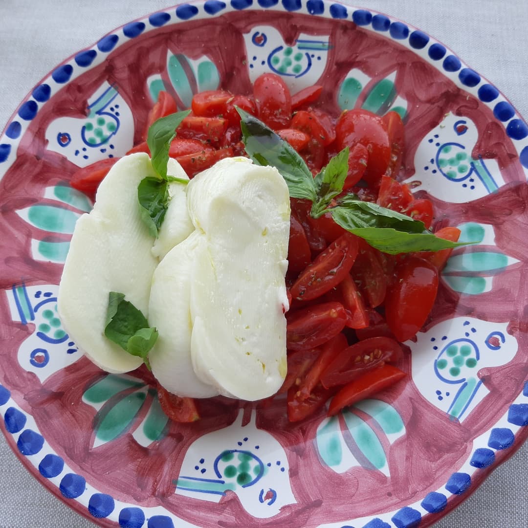 Italian dish with tomatoes and mozzarella