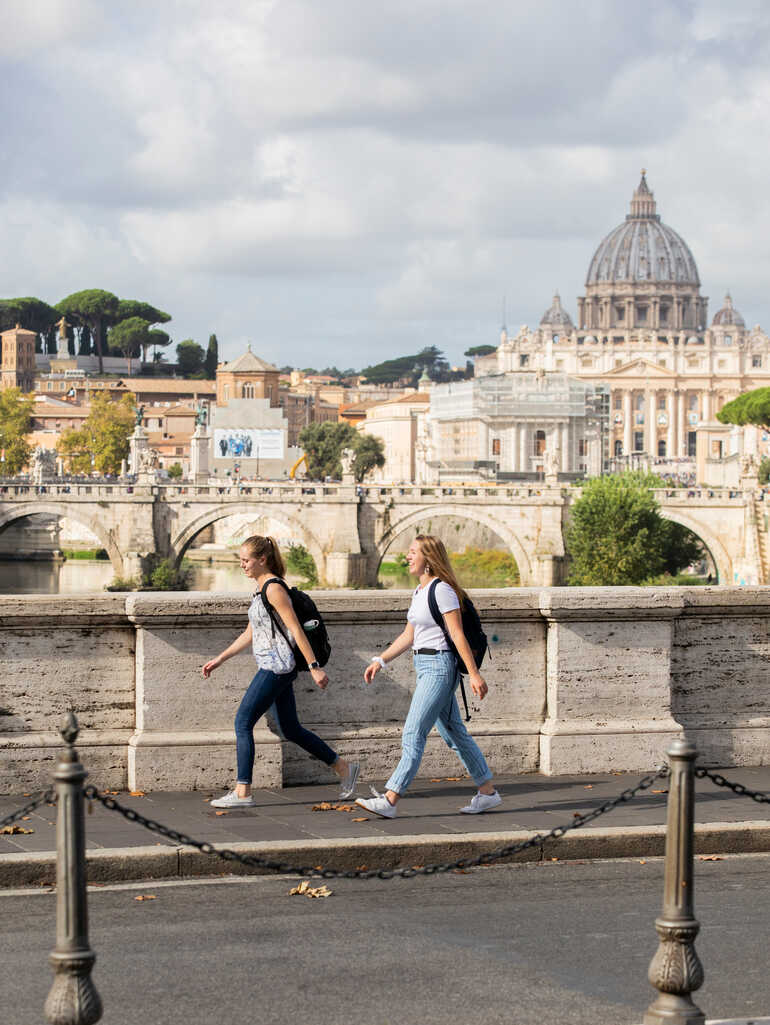 Students in Rome walking with backpacks