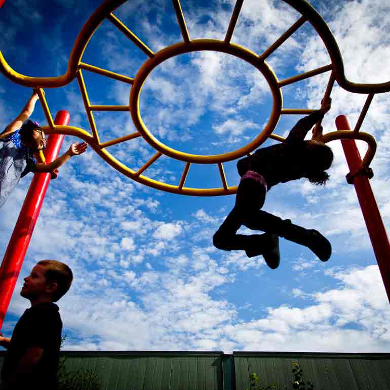Children playing on playground.