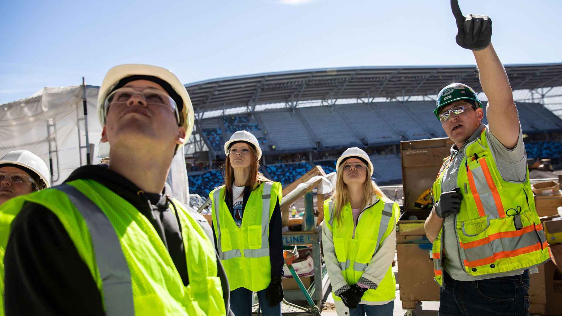A group of civil engineering students tour construction site at Allianz Field stadium.
