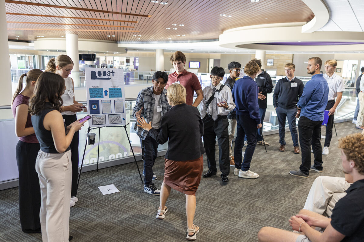 students engage while presenting ideas to other students