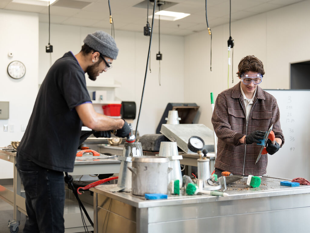Students working on a project in the High Bay
