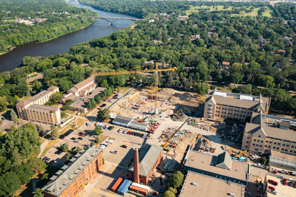 aerial photo of construction crews working on the Schoenecker Center