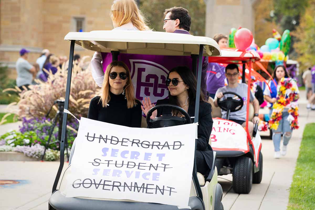 Members of Student Government ride in Homecoming Parade