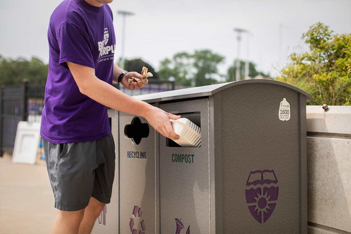 Student sorts trash on St. Paul campus
