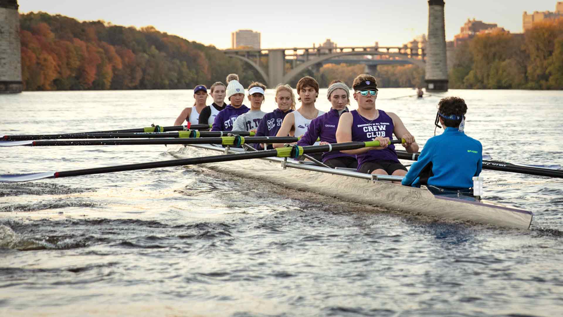 Rowing team members on the Mississippi river