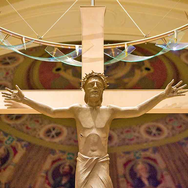 Crucifix above the altar inside The Chapel of St. Thomas Aquinas.