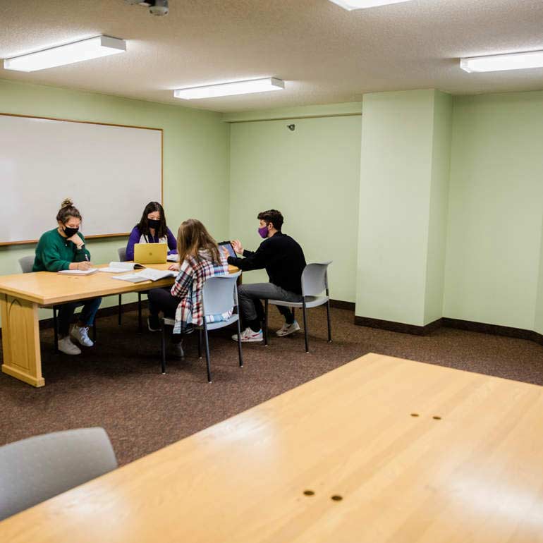 students studying together in a study lounge