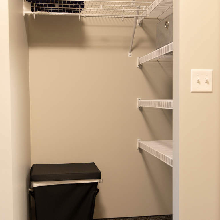 walk-in closet with shelving