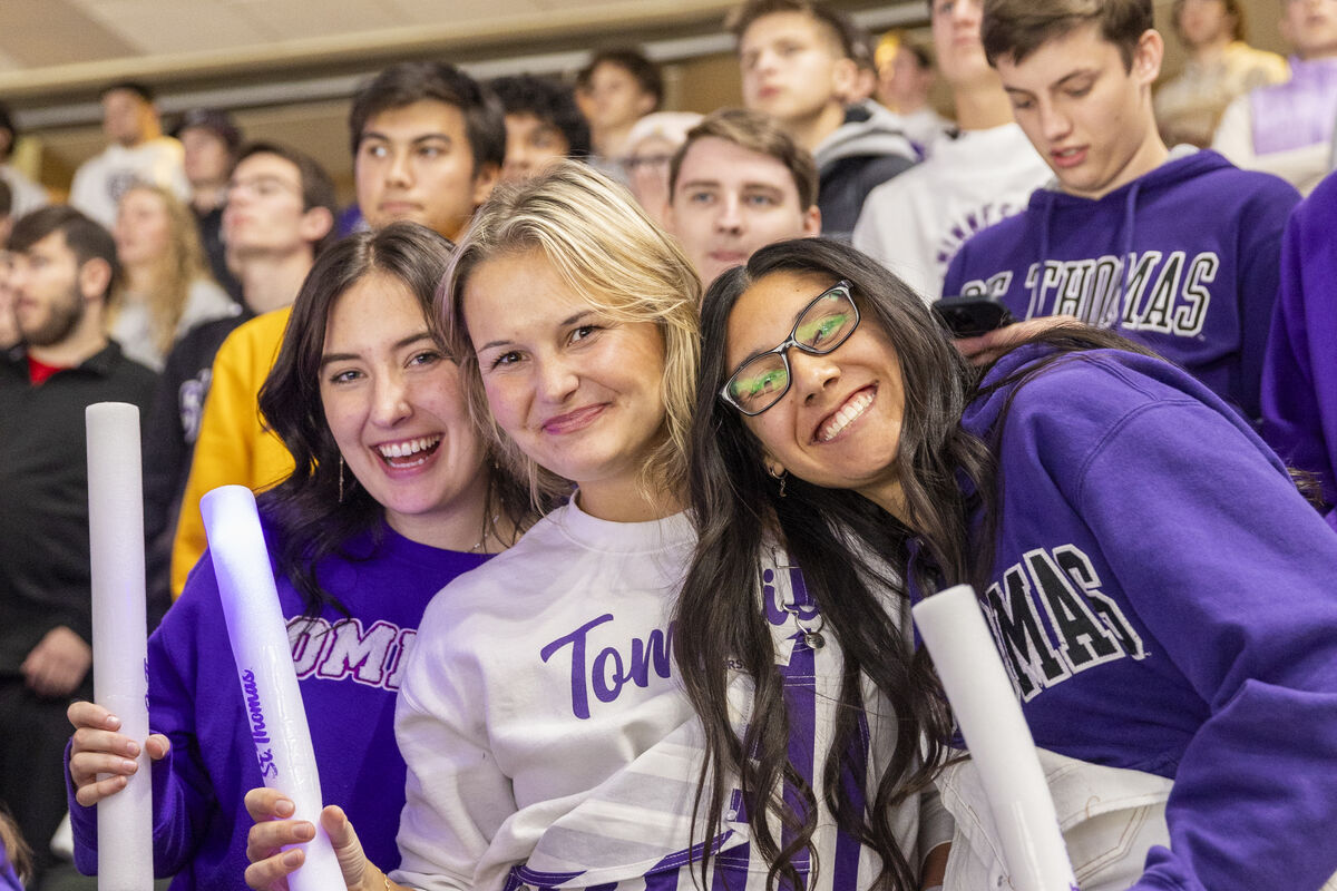 Students cheering and smiling