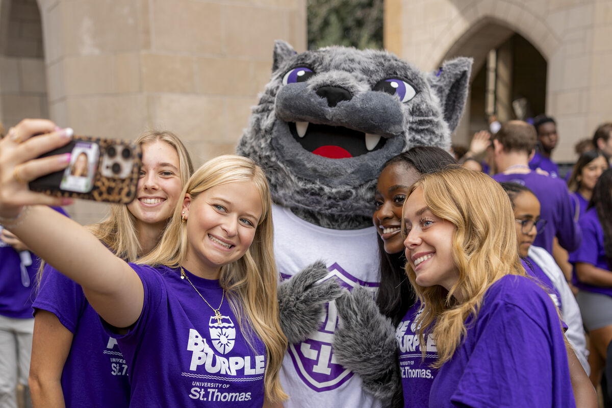 Students posing and smiling