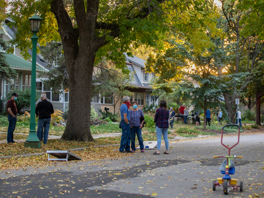 campus neighbors chat outside during national night out