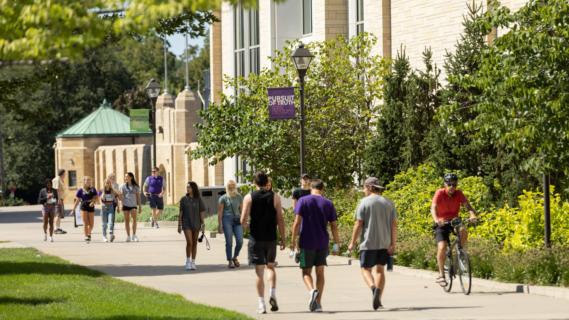 people walking on campus