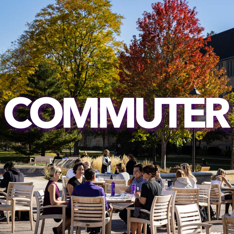 Background photo of the St. Thomas Plaza with people around a table. The word commuter written across in white.